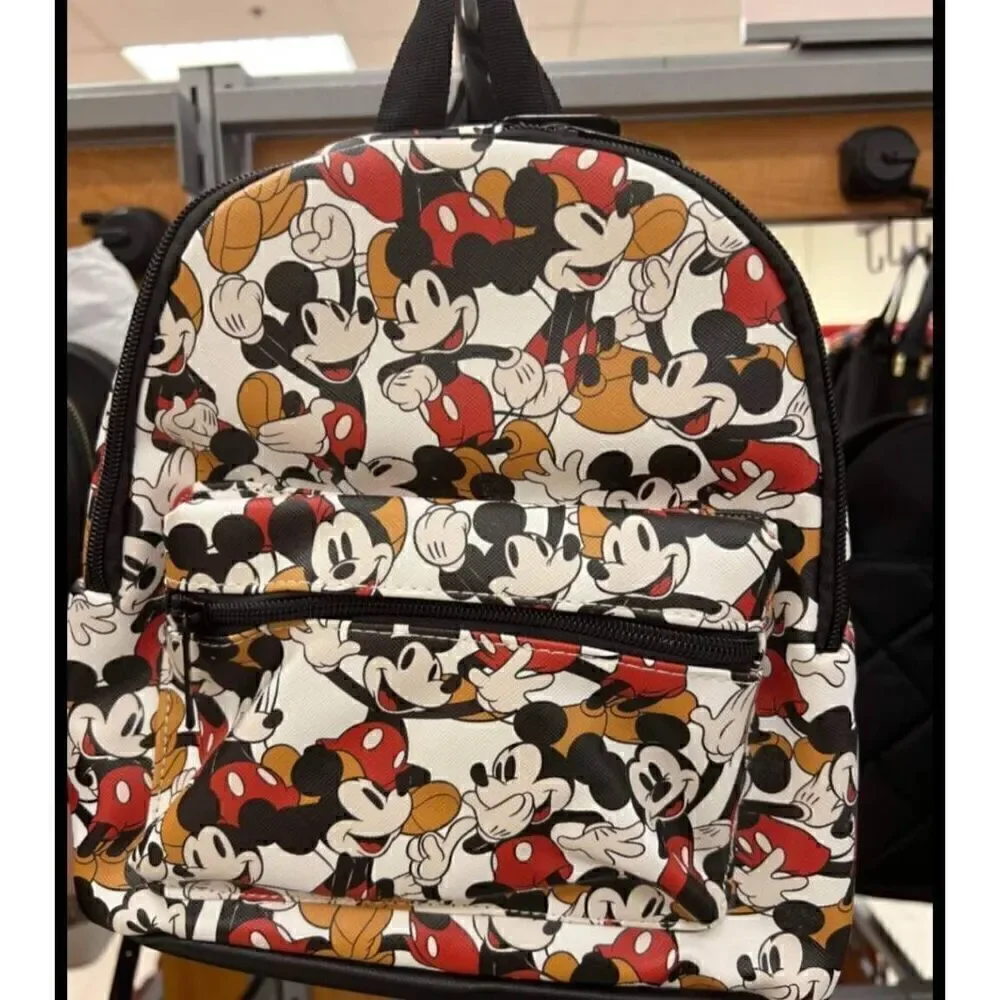 Disney Mickey Mouse backpack and matching card holder. Exterior zippered pocket